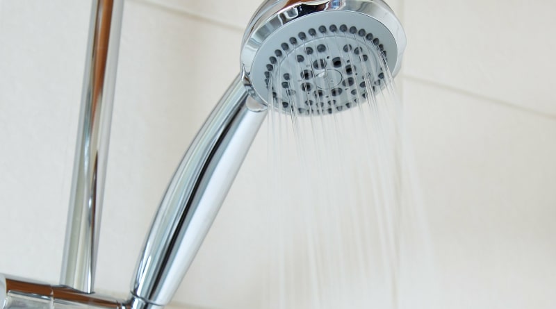 How to remove a shower head that is glued on