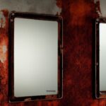 how to stop bathroom mirror rusting?