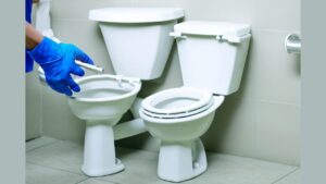 how to fix toilet leaking from bottom