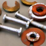 removing rusted toilet flange bolts