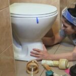 how do you replace a toilet flange