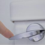 do you need to close toilet lid before flushing